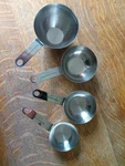 Professional Measuring Cups Stainless Steel Set 4 Metal Used. Price: $40.00.