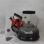 Creuset Enamel On Steel 1.7 Quart Whistling Tea Kettle Flint Oyster - New. Price: $114.95.